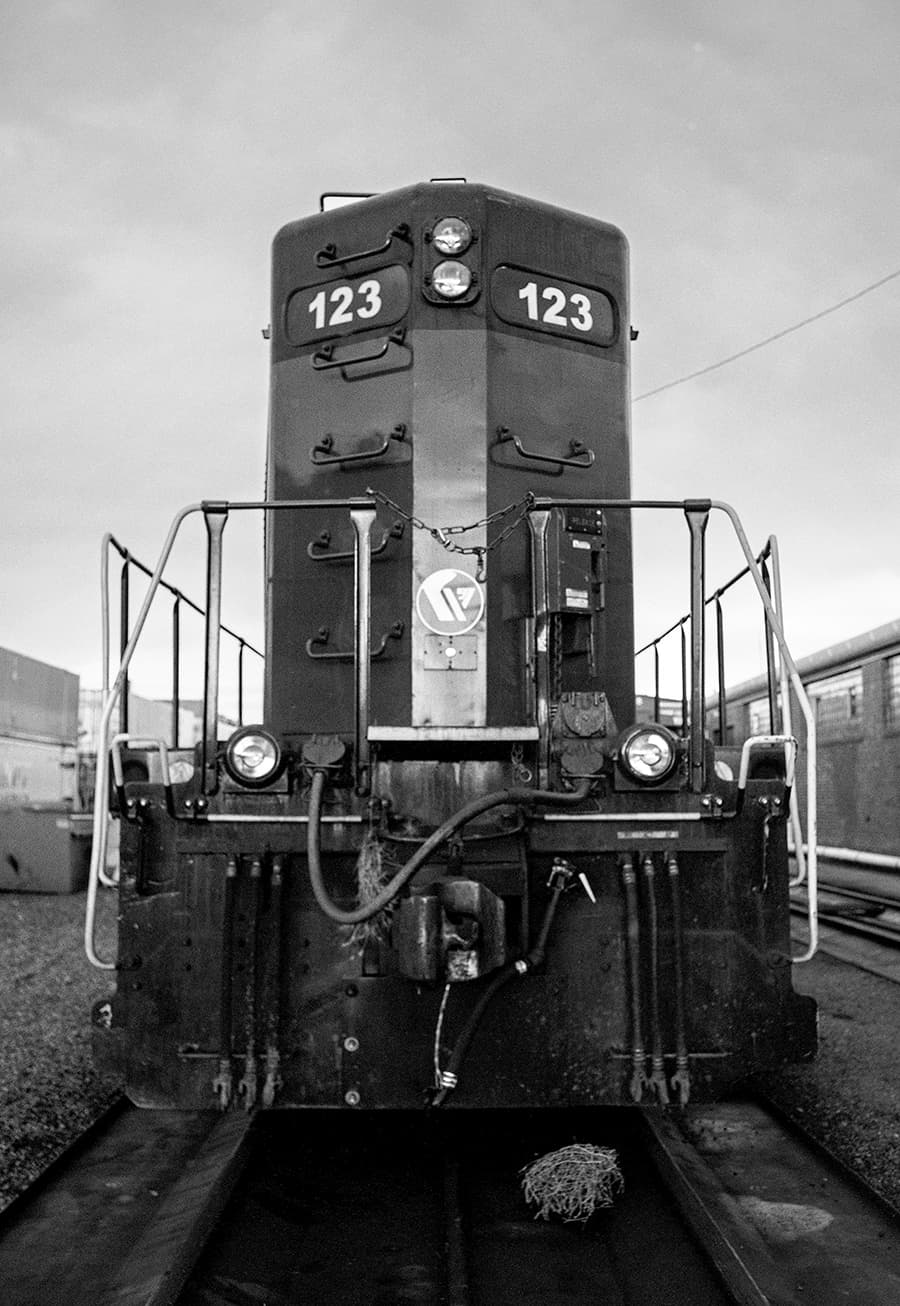 Locomotive engine 123 photographed head-on from track level at San Francisco rail yard