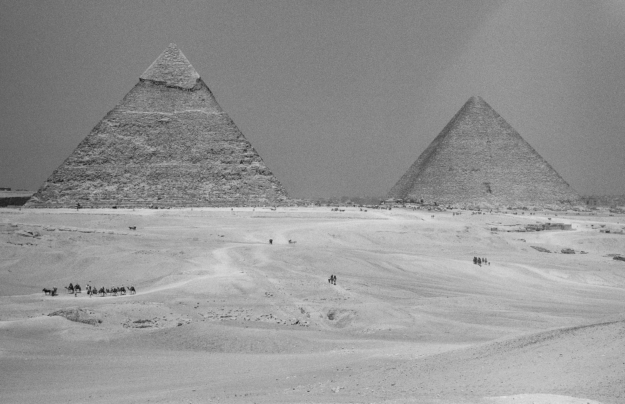 The pyramids of Giza across the open desert